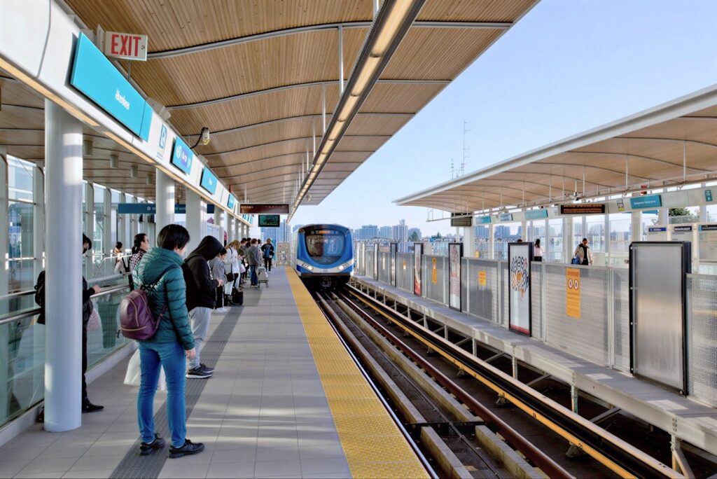 Canada Line train approaching at Aberdeen Station
