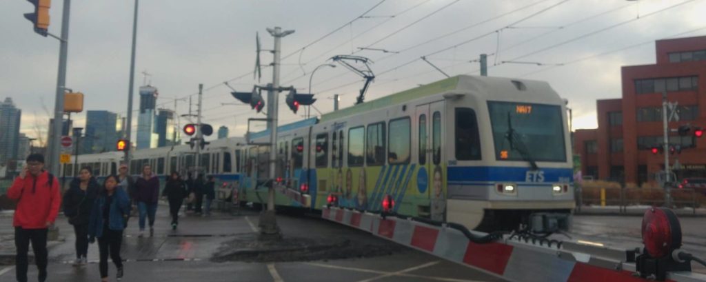 Edmonton Metro Line train crossing a street
